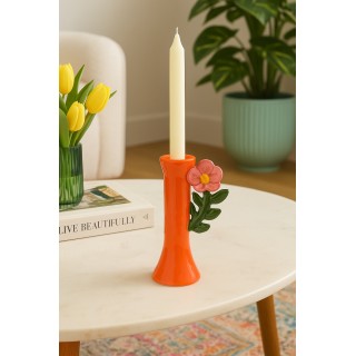 حامل شمع برتقالي مع زهرة